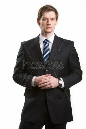 Фотография на тему Серьезный мужчина в деловом костюме на белом фоне