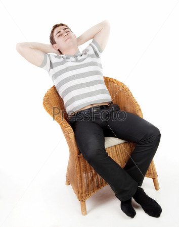Молодой человек в кресле