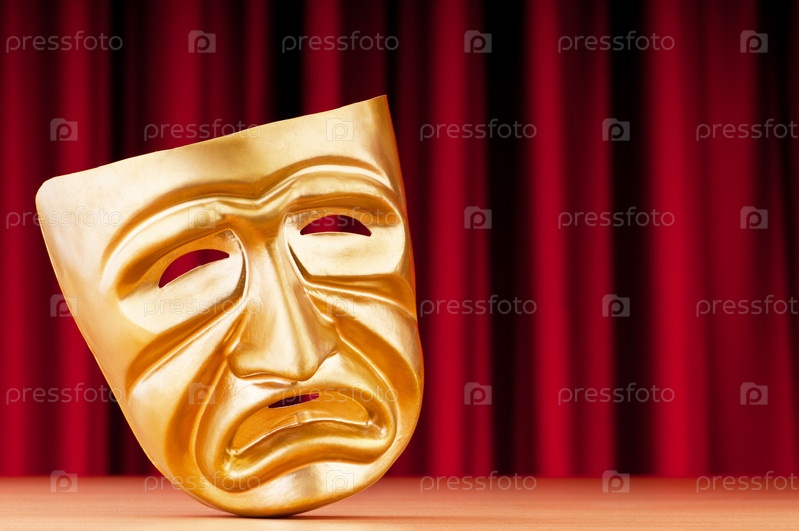 Фотография на тему Грустная театральная маска на фоне занавеса | PressFoto