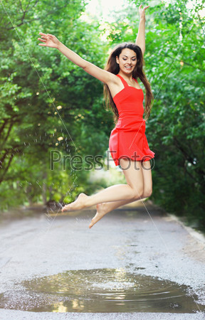      girl jumping in the water  Stock  Adobe  Stock