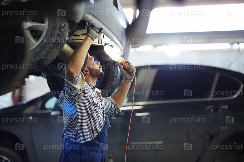 Фотография на тему Работа по ремонту автомобилей | PressFoto
