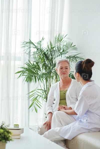 Doctor talking to patient
