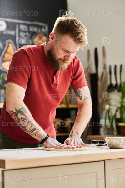 Chef Preparing Dough For Pizza