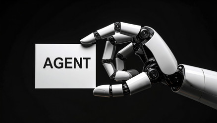 Роботизированная рука держит карту с надписью AGENT, символизирующую роль агентов на базе ИИ в автоматизации, принятии решений и цифровой трансформации - vidoc