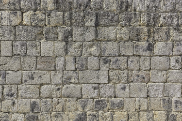 Ancient mayan stone wall forming geometric pattern in chichén itzá - Pippocarlot