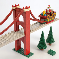 Красочный мост из конструктора Lego с санями Санты, пересекающими его во время праздников. Генеративный ИИ - RomanZ