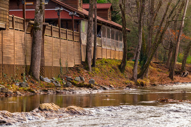 View of the Chattahoochee river and part of the café on its shore, Helen, USA - DrVerner