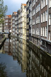 Нидерланды. Амстердам. Вид на каналы и дома исторического центра.
Netherlands. Amsterdam. Canals and Houses in the Old Town - ffoto-graff