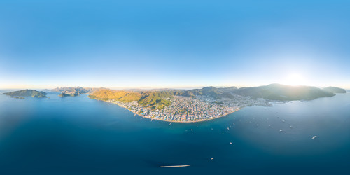 Мармарис, Турция. Сферическая аэропанорама 360x180 с видом на залив, яхты и береговую линию утром. Ясное небо и яркое солнце над пейзажем Мармариса. Панорама 360x180. Вид с воздуха - NikitaMaykov