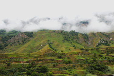 Scenic green mountains and hills covered with low clouds and fog. / Живописные зеленые горы и холмы, покрытые низкими облаками и туманом - kitikat