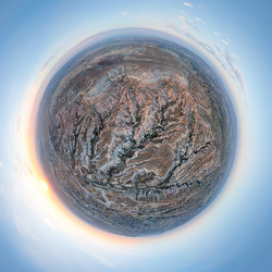 Гереме, Невшехир, Турция. Аэропанорама Красной долины на Little Planet, превращенной в миниатюрный сферический мир в мягком розовом свете заката над Каппадокией. Аэропанорама астероида с обзором 360 градусов - NikitaMaykov