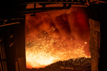 Working open hearth furnace at the metallurgical plant. Molten hot steelНа металлургическом комбинате. Выплавка горячей стали - kostya6969