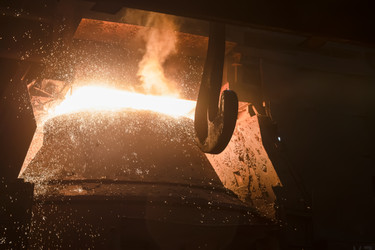 Working open hearth furnace at the metallurgical plant. Molten hot steelНа металлургическом комбинате. Выплавка горячей стали - kostya6969
