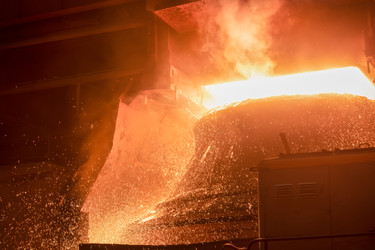 Working open hearth furnace at the metallurgical plant. Molten hot steelНа металлургическом комбинате. Выплавка горячей стали - kostya6969