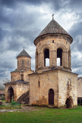 St Nicholas church and belfry in Gelati Monastery, Georgia. Сloudy and rainy day, medieval style - borisb17