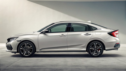 Автомобиль Honda Civic припаркован в современной студийной обстановке. Генеративный искусственный интеллект - RomanZ