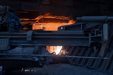 Working open hearth furnace at the metallurgical plant. Molten hot steelНа металлургическом комбинате. Выплавка горячей стали - kostya6969