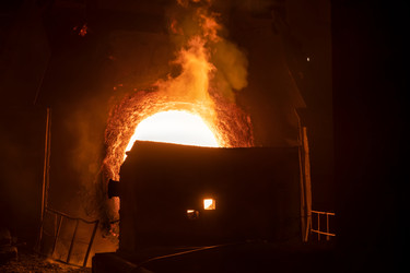 Working open hearth furnace at the metallurgical plant. Molten hot steelНа металлургическом комбинате. Выплавка горячей стали - kostya6969