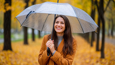 Happy Woman with Umbrella in Autumn Park Rain – Joyful Fall Weather Portrait for Lifestyle Blog, Positive Mood Content or Seasonal Branding - Kulkann75