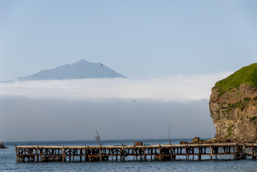 На фоне вулкана Богдан Хмельницкий. Рыбаки. Итуруп. On the background of the volcano Bogdan Khmelnitsky. Ribaki. Iturup. (marka) - marka