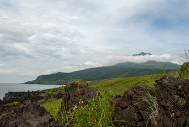 Лавовое плато Янкито с видом на вулкан Богдан Хмельницкий. о. Итуруп. The Yankito plateau with a view of the Bogdan Khmelnitsky volcano. Iturup Island. (Сахалин. Sakhalin. (marka) - marka