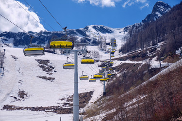 Skazka (Fairy tale) chairlift on the Strela Mountain Park. Roza Khutor ski resort. Sochi - Serg Zastavkin