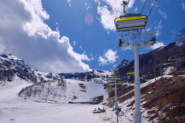 Skazka (Fairy tale) chairlift on the Strela Mountain Park. Roza Khutor ski resort. Sochi - Serg Zastavkin