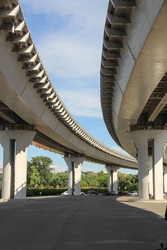 Modern concrete highway overpass and bridge structure from a low angle. / Современная бетонная эстакада шоссе и конструкция моста с нижнего ракурса - kitikat