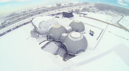 Semicircular hangar for helicopters on cloudy winter day - paha_l