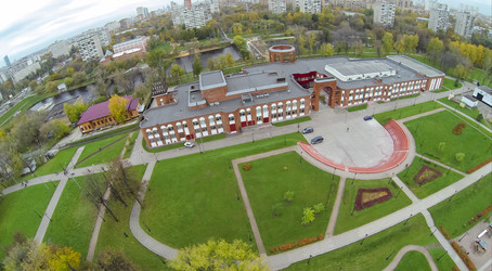 Green territory near brick building, view from unmanned quadrocopter - paha_l