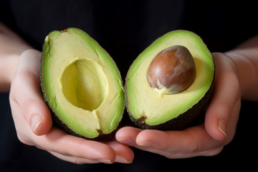 Female hand avocado fruit. Generate Ai - yliv
