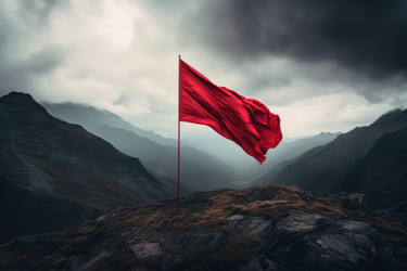 Red flag of success on foggy mountain. Generate Ai - yliv