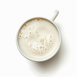 Coffee with milk creating a beautiful pattern of bubbles viewed from above, perfect for breakfast or a coffee break - yliv