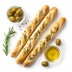 Tasty grissini with herbs and spices lying on white background - yliv