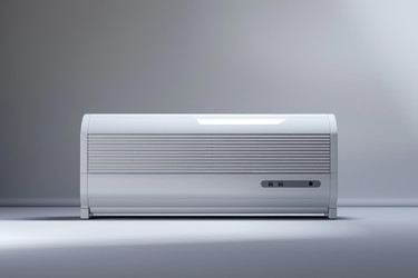 Modern air conditioner cooling a room with a grey wall - yliv