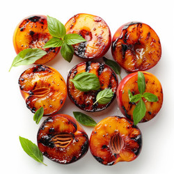 Delicious grilled peach halves with fresh basil leaves - yliv