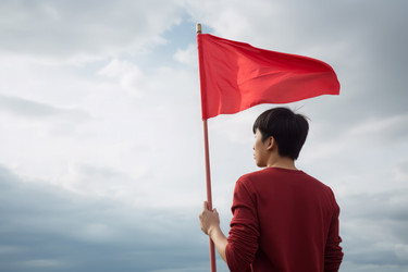 Alone man with red flag. Generate AI - yliv