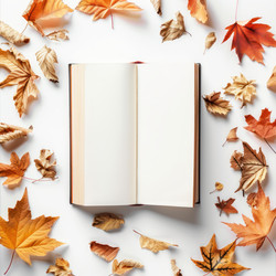 Открытая книга с пустыми страницами, украшенная яркими осенними листьями, создающими уютную осеннюю сцену - yliv