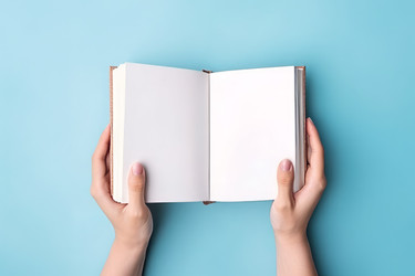 Hands holding blank book. Generate AI - yliv
