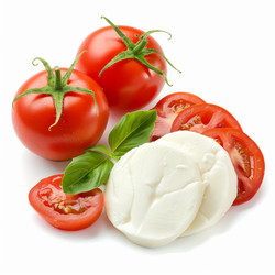 Fresh mozzarella cheese slices with tomatoes and basil leaves on white background - yliv