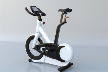 Modern stationary bike is standing on grey background, ready for a great workout - yliv