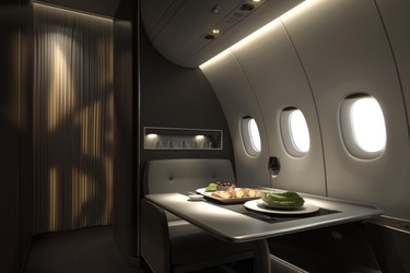 Luxurious private jet interior with dinner table and large windows, featuring comfortable seating and elegant design - yliv