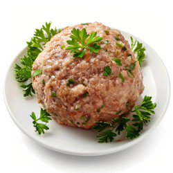 Large meatball garnished with fresh parsley on white plate - yliv