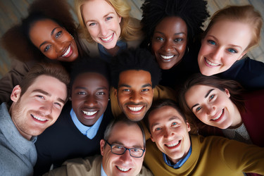 Group of diverse businesspeople forming a circle and smiling - yliv