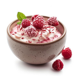 Bowl of yogurt garnished with frozen raspberries and chocolate sprinkles - yliv