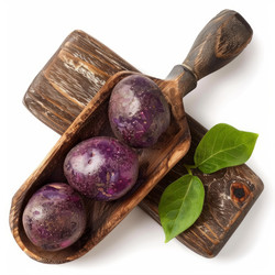 Three vibrant purple potatoes sit in a wooden scoop atop a rustic wooden surface, accompanied by fresh green leaves - yliv