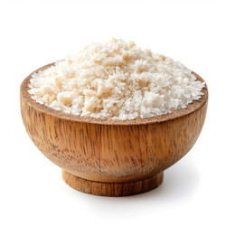 Wooden bowl overflowing with coarse ground gourmet sea salt - yliv