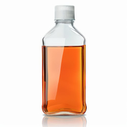 Transparent bottle containing orange liquid reflecting on white background - yliv