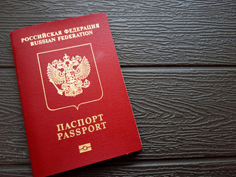 российский загранпаспорт на черном фоне с пробелом для копирования - YuYu_art