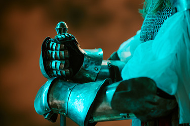 Knight in Armor Holding Medieval Sword for Historical Project - AnnaStills